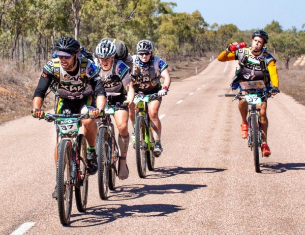 Peak Adventure riding hard in an attempt to regain their lead.